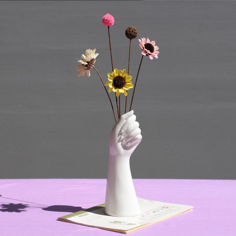 Hand flower arrangement vase